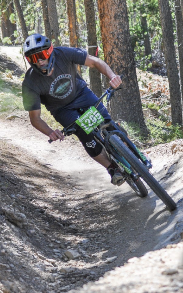 Ryan biking in Colorado mountains